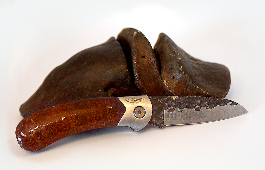 Custom knife handles from dinosaur bones
