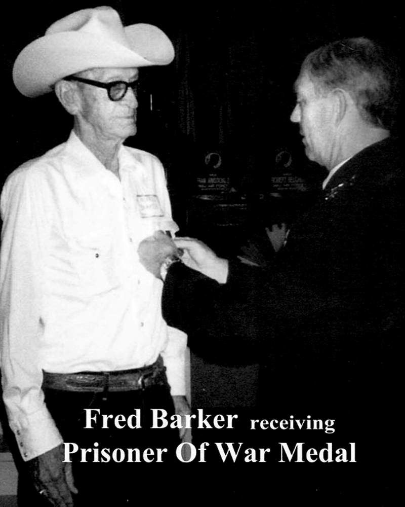 Fred barker receiving POW Medal