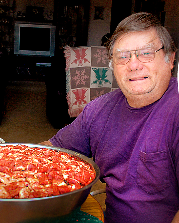 Peter Gremillion making 27 pounds of sausage